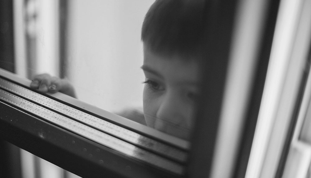 Child looking reflective